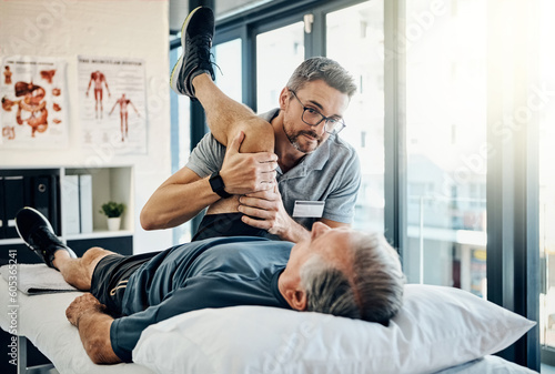Stretching legs, help and a physiotherapist with a man for wellness and recovery support. Rehabilitation, health and a male doctor helping an elderly person with physiotherapy on body muscle photo