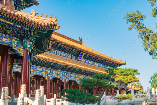 The ancient building of Shouhuang Hall in Beijing Jingshan Park under the blue sky photo