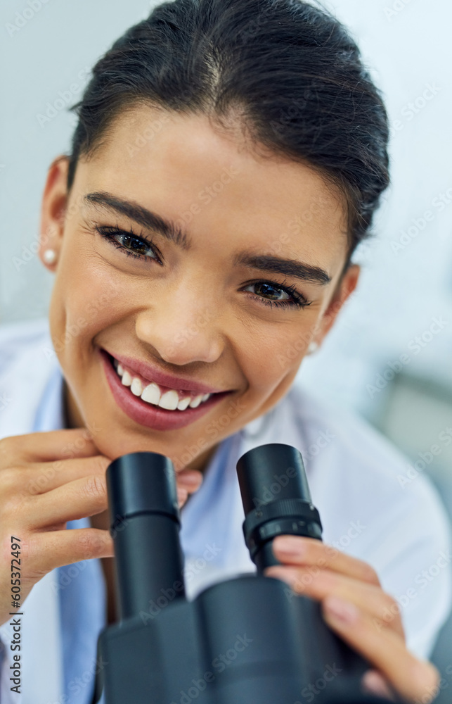 Face, woman and scientist smile with microscope in lab for medical research. Happy, science portrait and female doctor with DNA experiment and analysis, particle test and future investigation Face, woman and scientist smile with microscope in lab for medical research. Happy, science portrait and female doctor with DNA experiment and analysis, particle test and future investigation