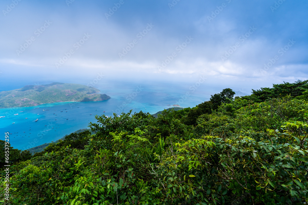 Ben Dam Port in Con Dao island, Vietnam with beautiful blue sea blue sky mountain and colorful boats. Ben Dam Port in Con Dao island, Vietnam with beautiful blue sea blue sky mountain and colorful boats.