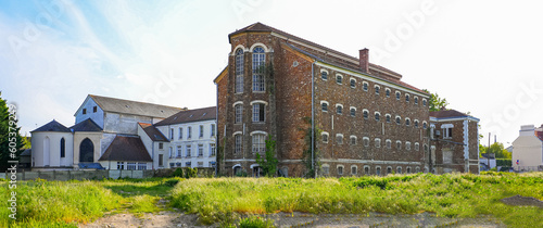 Former prison of the city center of Meaux in the French department of Seine et Marne near Paris - Old stone jail with barred windows and a large nave