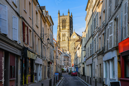 Saint Etienne Cathedral of Meaux in the sun, as seen at the end of a dark narrow shopping street in the department of Seine et Marne near Paris, France © Alexandre ROSA