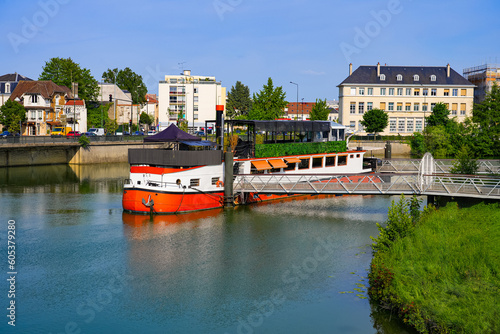 Restaurant on a barge moored on the Marne riverside in the city center of Meaux in the Seine et Marne Department near Paris, France