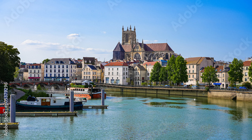 Saint-Etienne Cathedral protruding above apartment buildings near the Marne River in the Seine et Marne department near Paris, France