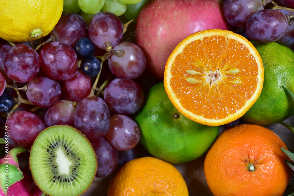 assorted fruits, top view healthy food concept Including high vitamin fruits, fresh fruits, tropical fruits assorted fruits, top view healthy food concept Including high vitamin fruits, fresh fruits, tropical fruits