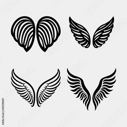 Set of hand drawn bird or angel wings of different shape in open position