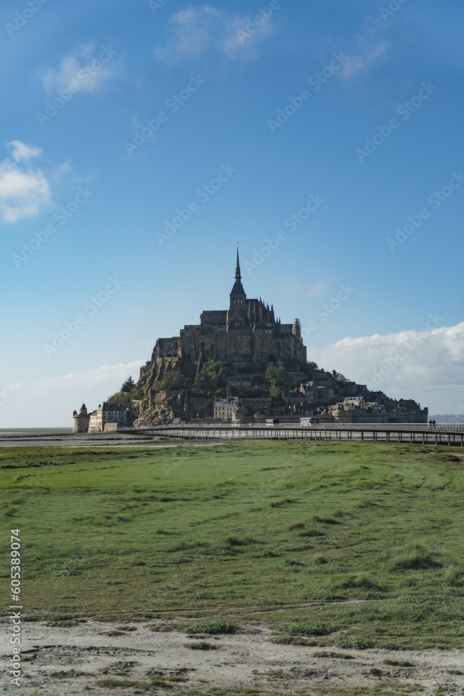 Obraz premium St Mont Michel. Mont-Saint-Michel in France. A grand, awe inspiring building of historic significance, the Abbey on the tidal island in Northern France