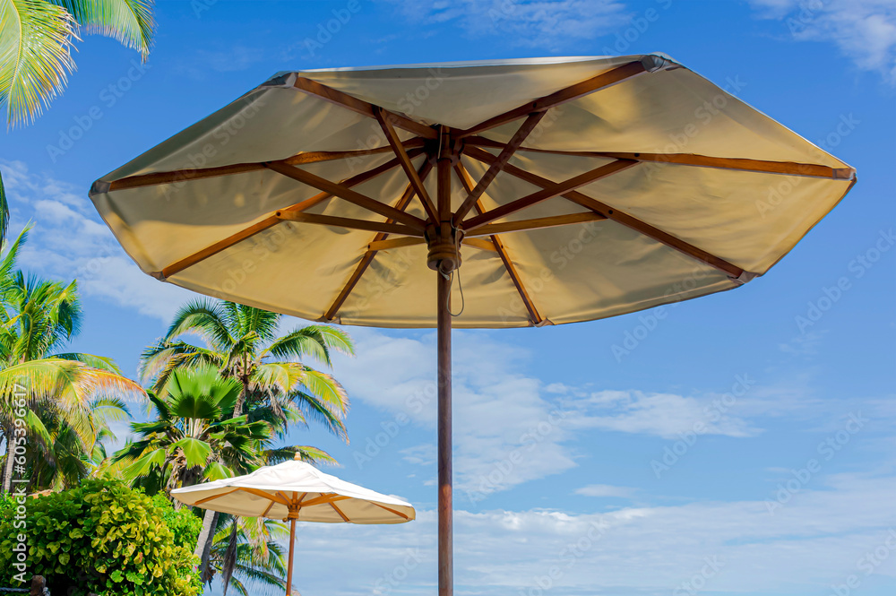 Panoramic view with large parasols in front of the Peruvian coast. Panoramic view with large parasols in front of the Peruvian coast.