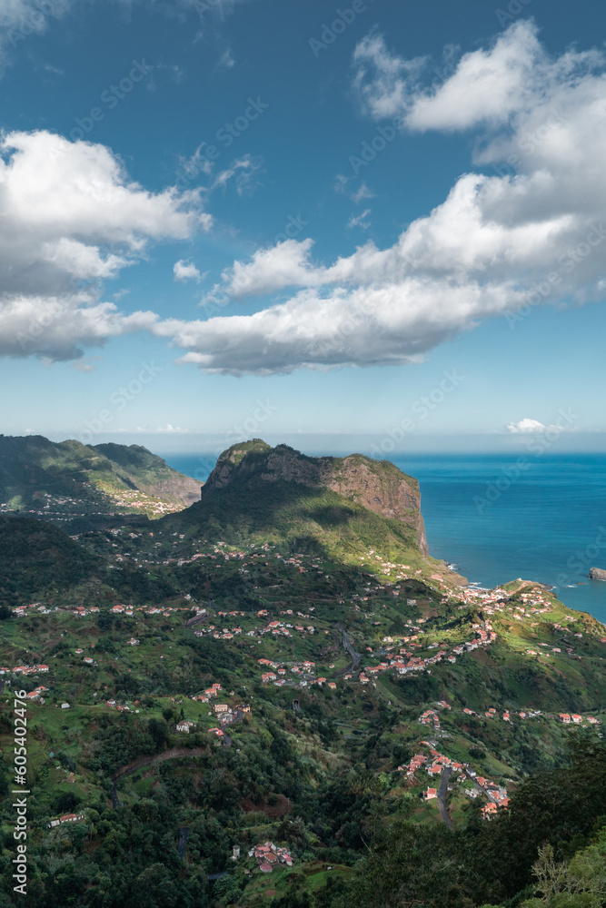 Landscape Photography of Madeira's green hills with a huge rock formation in the middle