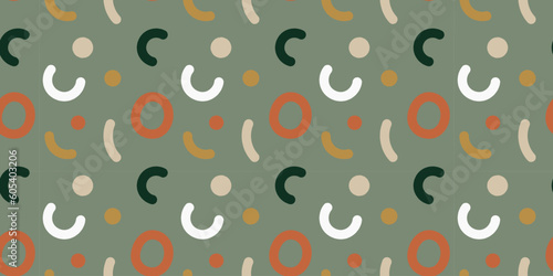 Crazy doodle lines and shapes of natural tones on green background. Cute naive seamless boho pattern. Creative minimalistic trendy hand drawn design for kids. Simple childish scribble backdrop