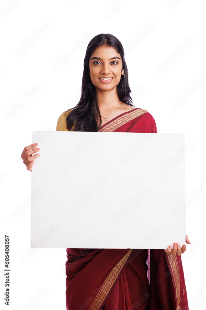 Happy Indian woman in traditional saree holding sign board isolated on white. advertisement concept. Happy Indian woman in traditional saree holding sign board isolated on white. advertisement concept.