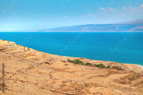 The Dead Sea is asalt lake in the Middle East, located between Israel and Jordan. Dead sea surface is 430.5 metres below sea level, making its shores the lowest land-based elevation on Earth. © dotsikalex1