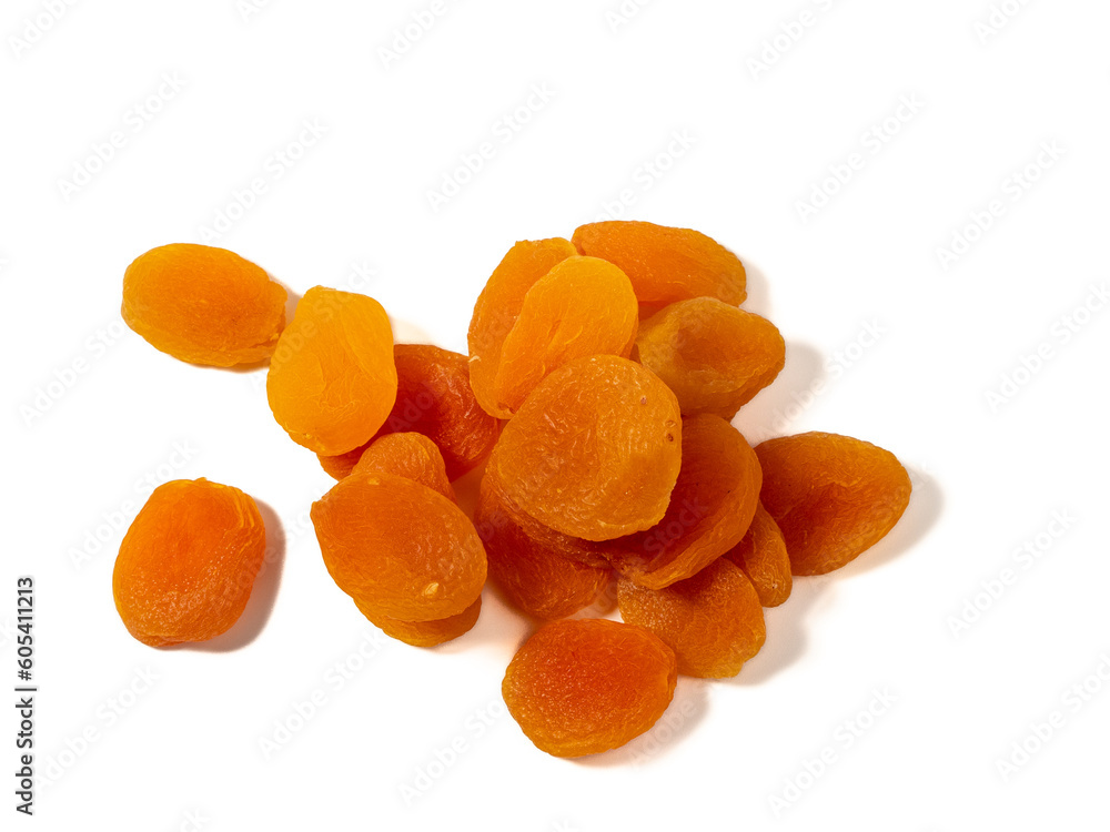 Wooden bowl of dried apricots on a white background, selective focus. Dried apricots close up. Wooden bowl of dried apricots on a white background, selective focus. Dried apricots close up.