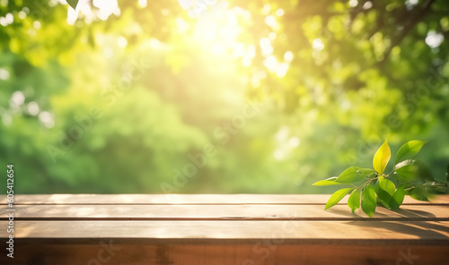 Green leaves on wooden background