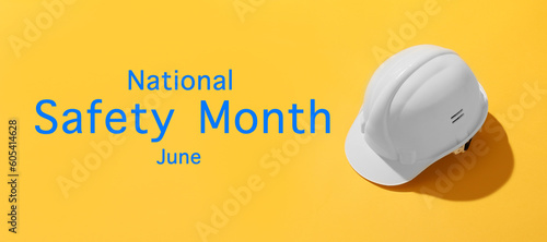 Banner for National Safety Month with hardhat photo