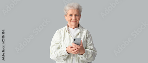 Senior woman with modern mo...