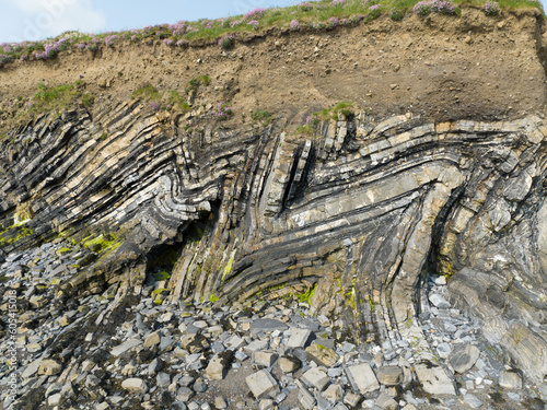 metamorphic rock formation on irelands eastern coastline photo