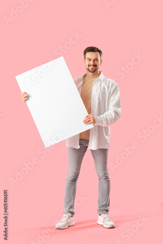 Handsome man with big blank...