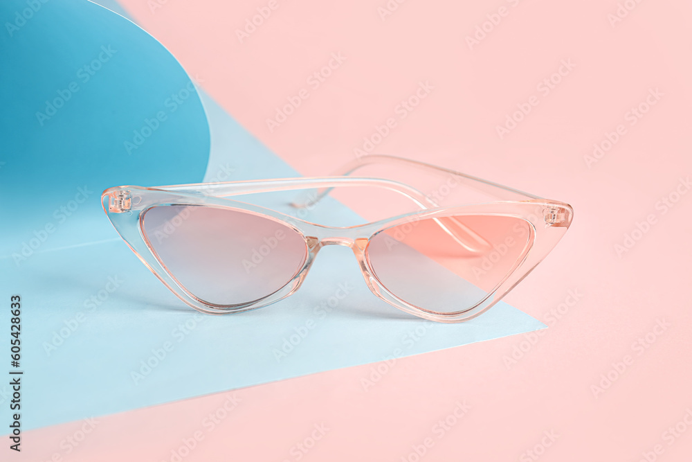 Stylish sunglasses on color background Stylish sunglasses on color background