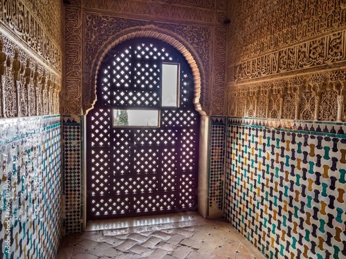 Textures in the walls and doors in nasrid palaces of Alhambra in Granada, Spain