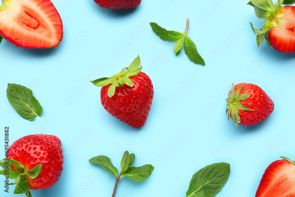 Fototapeta premium Fresh strawberries on blue background