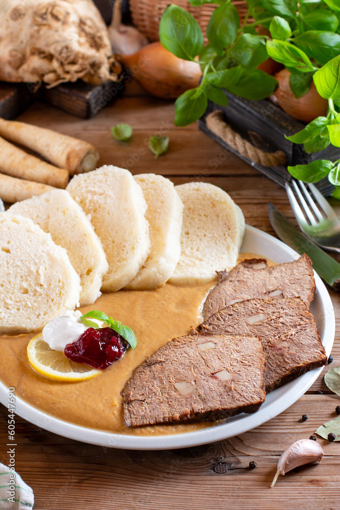 Dumpling with sirloin sauce (traditional Czech food Dumpling with sirloin sauce (traditional Czech food