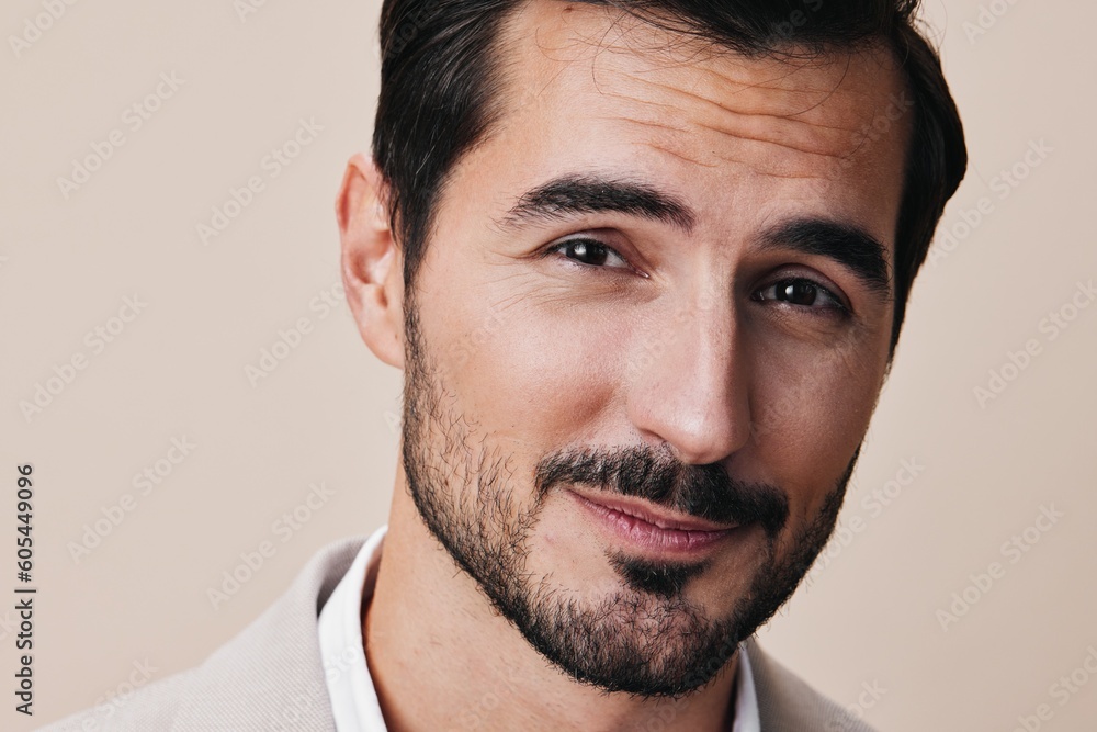 Fototapeta premium man handsome copyspace businessman happy beige portrait suit business arm smiling