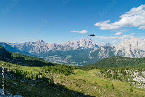 Panorama of the Dolomites in Italy  with a drone in the foreground.