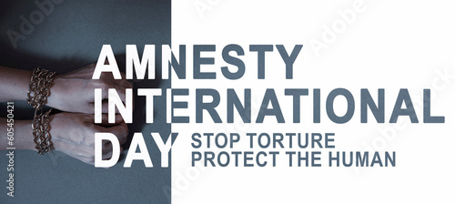 Amnesty International Day concept. Our rights are human rights. Text stop torture protect the human on gray background. Human hands tied with a chain photo