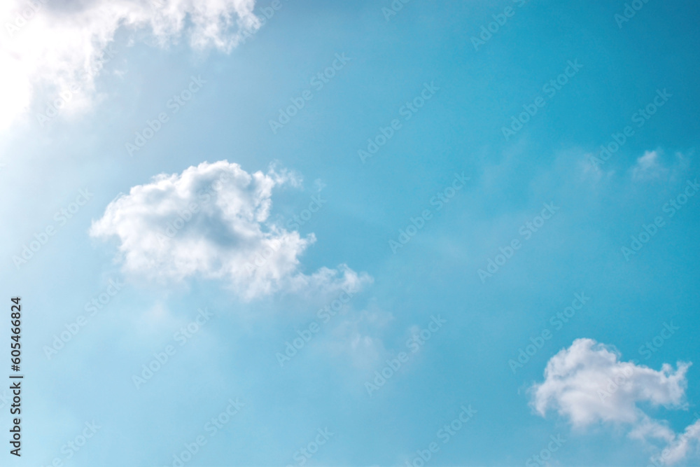 Blue sky with white fluffy cloud. The concept of the freedom of life, never give up and new life beginning. Turquoise sky background. Blue sky with white fluffy cloud. The concept of the freedom of life, never give up and new life beginning. Turquoise sky background.