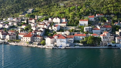 A Timelapse of a cruise ship leaving Kotor Montenegro and old mediterranean port.