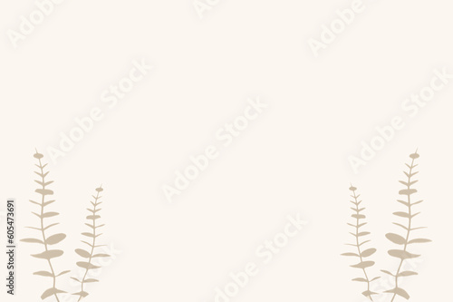 Background with striking shadows of eucalyptus leaves on a gentle beige surface.