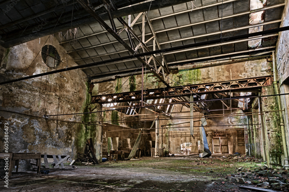 industrial archaeology, old abandoned and collapsed factory, ruins of an ancient building