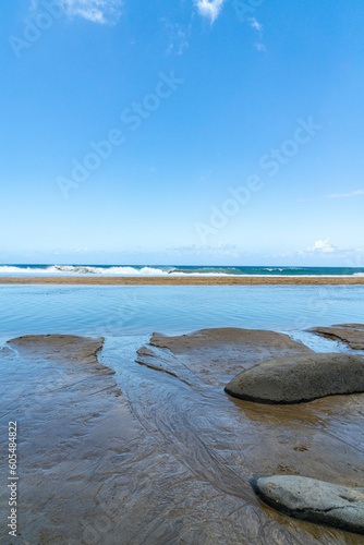 Relaxing at the Hanakapi`ai Beach in Kauai, Hawaii photo