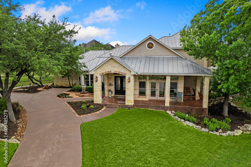 Wallpaper Mural a front view of a home with grass Torontodigital.ca