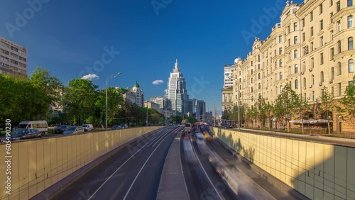Cars traffic on Garden-Triumph street timelapse hyperlapse in Moscow, Russia. Blue cloudy sky at summer day. Circular avenue goes around central Moscow along old rampart surrounded Zemlyanoy Gorod