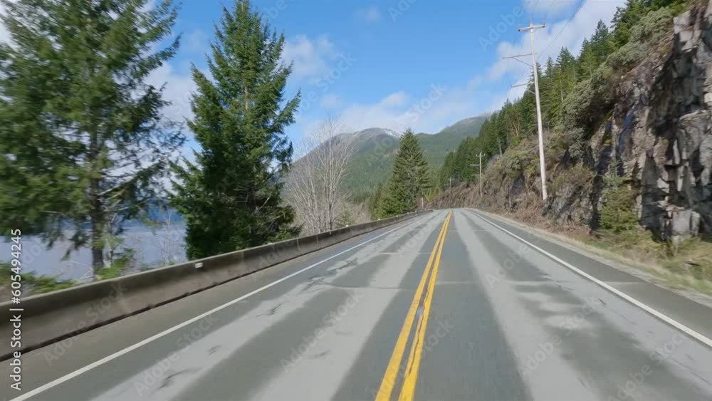 Scenic Road in Canadian Nature from Port Alberni to Tofino. Pacific Rim Hwy, Vancouver Island, British Columbia, Canada. Scenic Road in Canadian Nature from Port Alberni to Tofino. Pacific Rim Hwy, Vancouver Island, British Columbia, Canada.