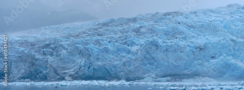 Panoramic image of the blue ice on one of several glaciers with ice floes in the foreground on Prince William Sound near Whittier Alaska