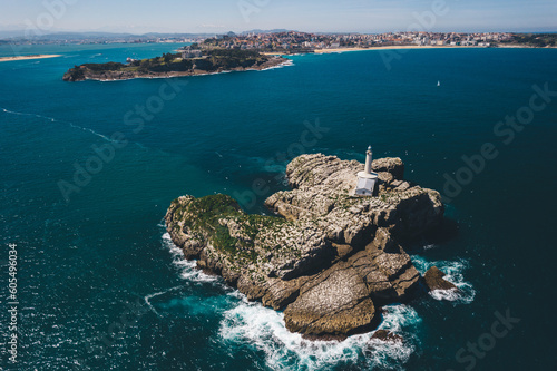 Aerial view of Faro De La Isla De Mouro (Faro de Mouro) across from the Magdalena Peninsula in Santander, Cantabria, Spain, Europe