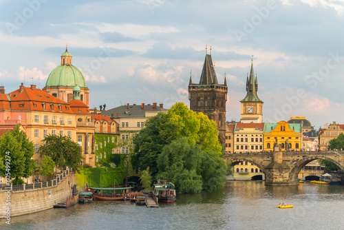 Charles Bridge and Church of Saint Francis of Assisi with Old Town Bridge Tower against sky, UNESCO World Heritage Site, Prague, Bohemia, Czech Republic (Czechia), Europe photo