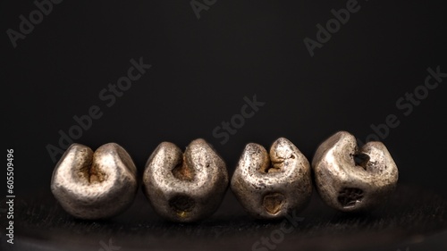 antique Thailand money coin on dark background
