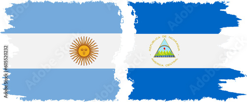 Nicaragua and Argentina grunge flags connection vector
