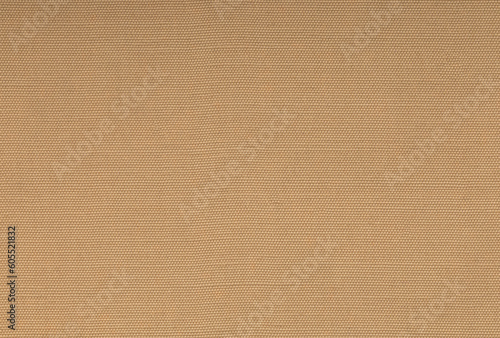 Brown canvas background for festive decoration and internet design. texture of sandpaper.