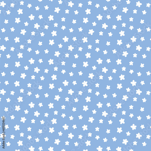 Cute seamless pattern with small flowers. Vector illustration. Kids minimalist print with daisies. Flat style. Spring pattern with blooming flowers.