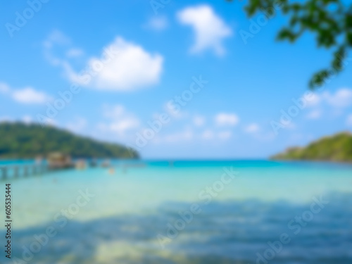 Blurred seascape view background, blurry blue sea water and wave surf, wooden bridge, green hill island beach ocean, defocused summer backgrounds, vacation and holiday concept.