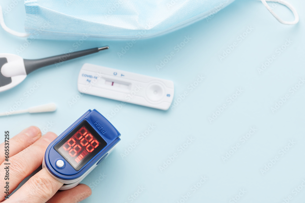 Fototapeta premium Pulse oximeter measuring oxygen saturation in blood and heart rate