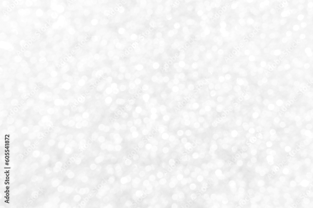 White and gray bokeh background. Photo can be used for the concepts of New Year, Christmas, Wedding Anniversary and all celebrations. White and gray bokeh background. Photo can be used for the concepts of New Year, Christmas, Wedding Anniversary and all celebrations.