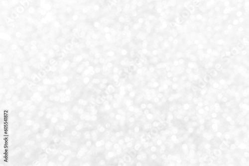 White and gray bokeh background. Photo can be used for the concepts of New Year, Christmas, Wedding Anniversary and all celebrations. 
