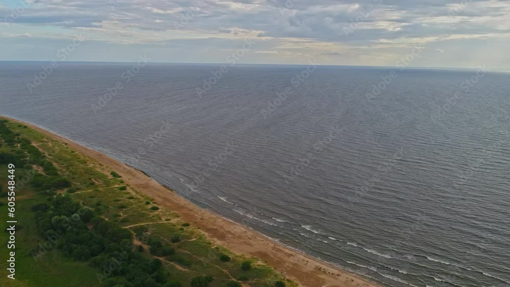 A wide aerial shot of the coastline and the sea near the city of Riga in Latvia, Europe. A wide aerial shot of the coastline and the sea near the city of Riga in Latvia, Europe.