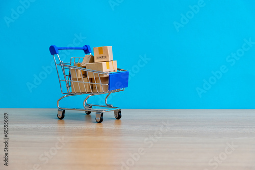 Paper boxes in a shopping cart
